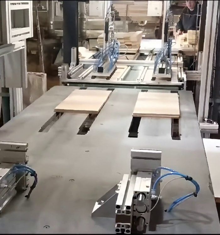 Instalación maquina de transporte tablas de parquet